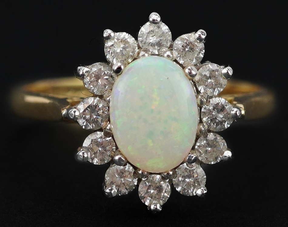 18ct gold cabochon opal and diamond flower head ring, each diamond approximately 2.0mm in