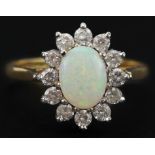 18ct gold cabochon opal and diamond flower head ring, each diamond approximately 2.0mm in