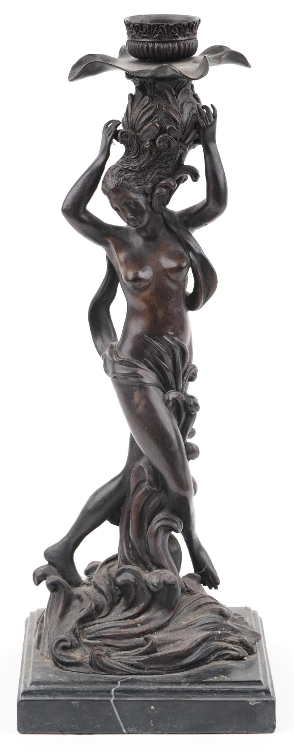 Classical patinated bronze candlestick in the form of a semi nude female on waves, raised on a - Image 2 of 4