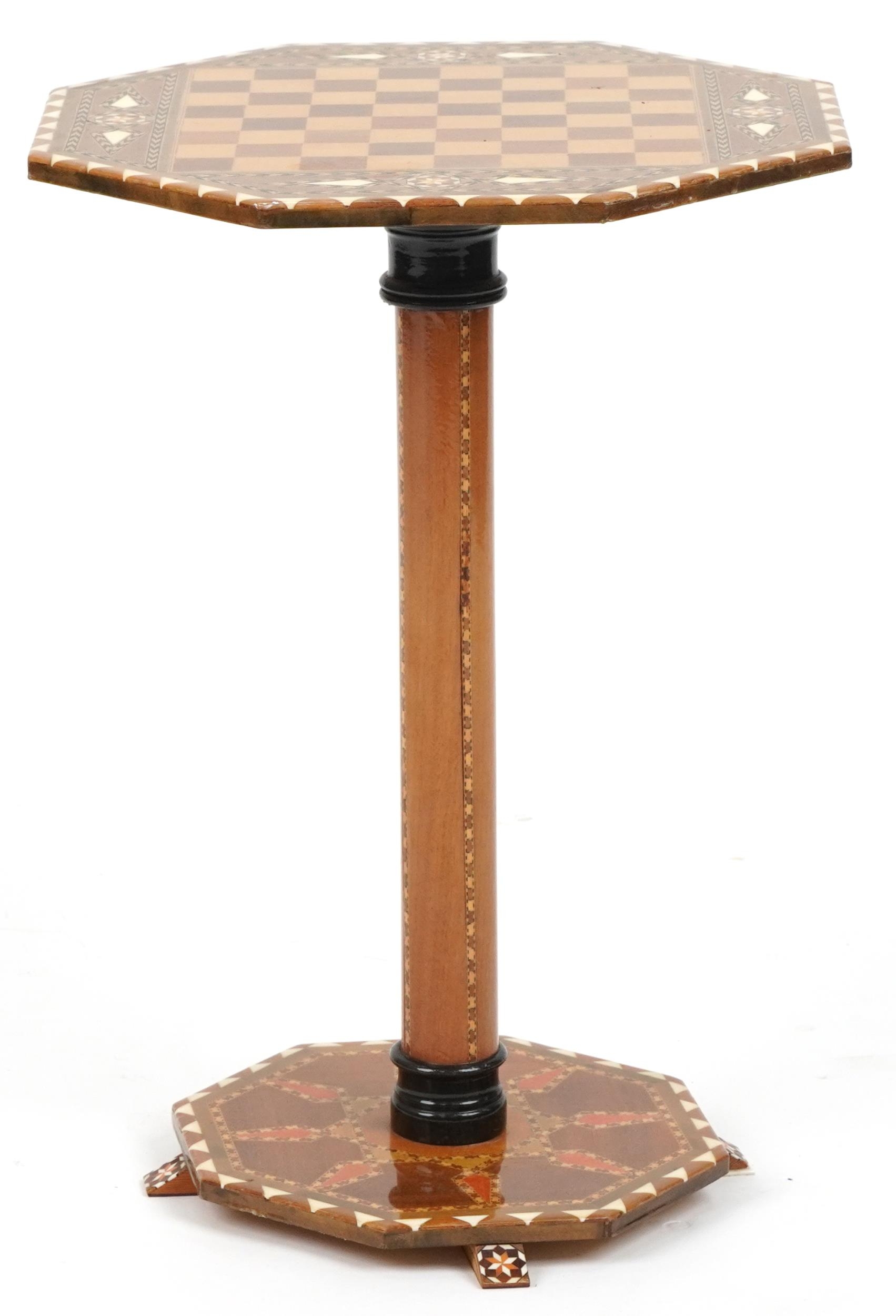 Manner of Liberty & Co, Moorish style inlaid chess occasional table with octagonal top and base, - Image 3 of 3