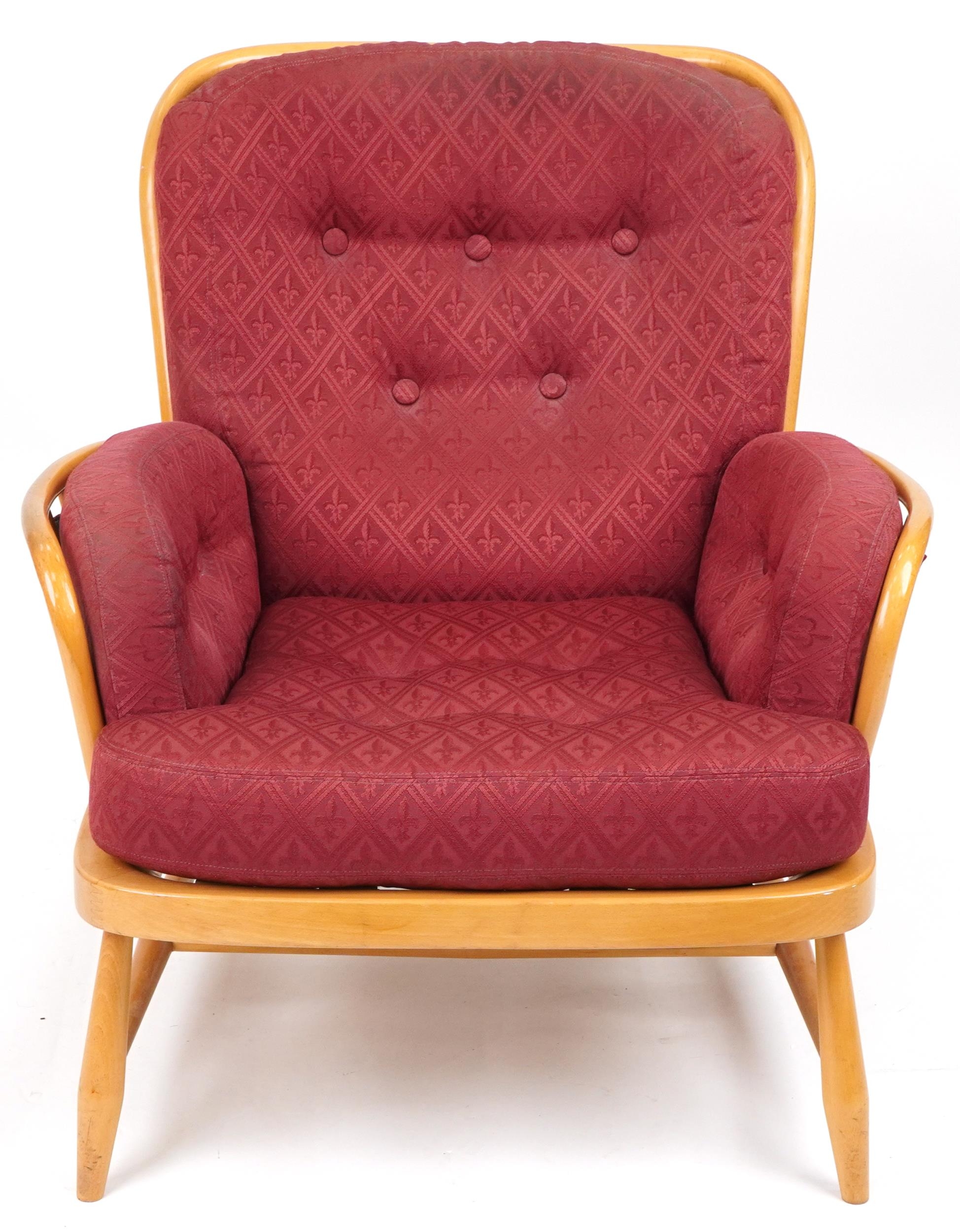 Ercol light elm Jubilee stick back armchair with red fleur de lis upholstered cushioned seats, - Image 2 of 6