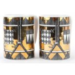 Piero Fornasetti, pair of vintage Italian gold lustre mugs decorated with shields, each 12.5cm high