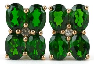 Pair of 9K gold green and clear stone flower head stud earrings, possibly olivine, 1.4cm high, 3.3g