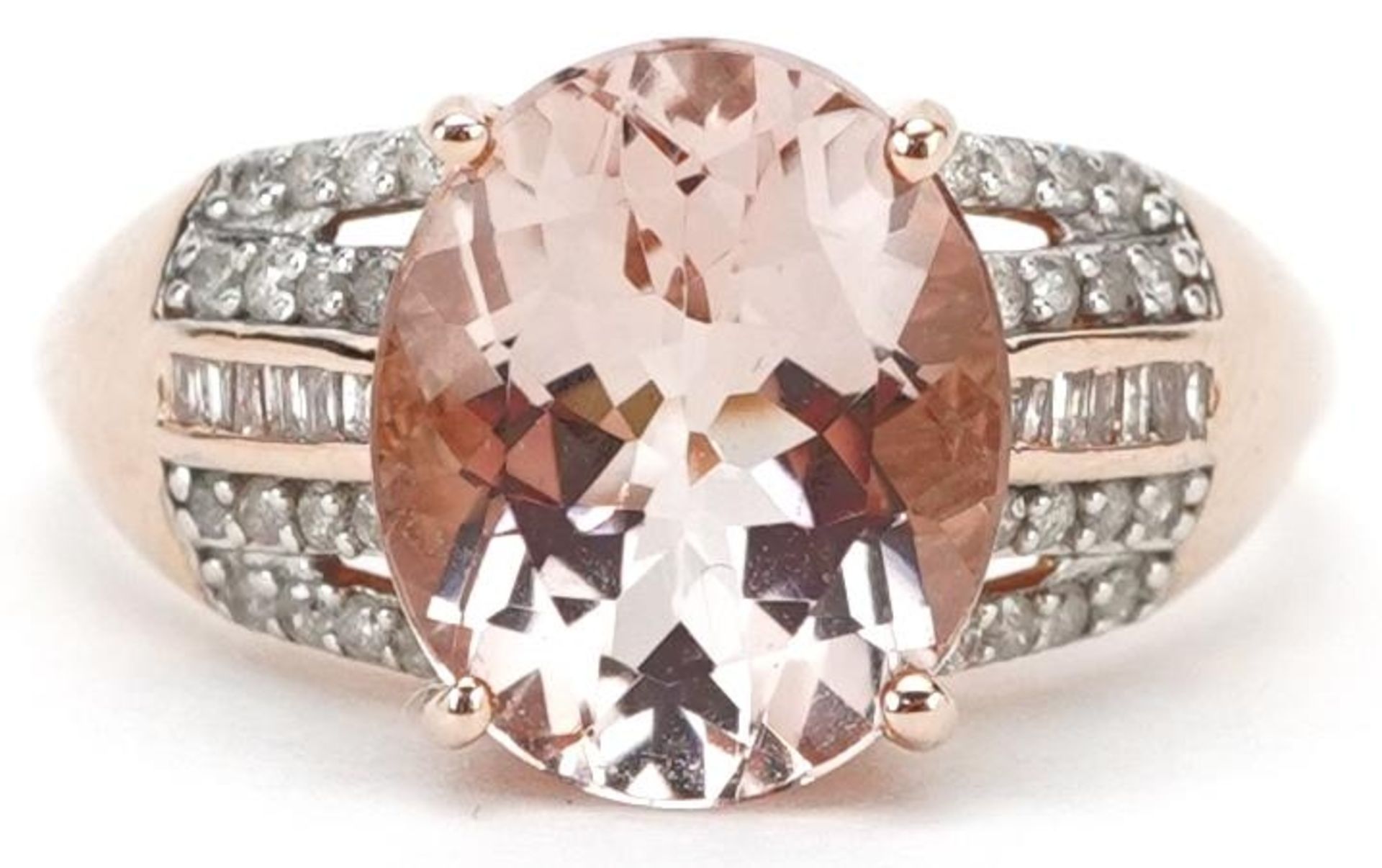 14ct gold morganite ring with diamond set shoulders, the morganite approximately 11.80mm x 9.95mm