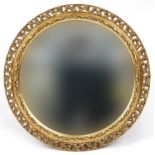 Circular gilt framed acanthus design wall mirror with bevelled glass, 56cm in diameter