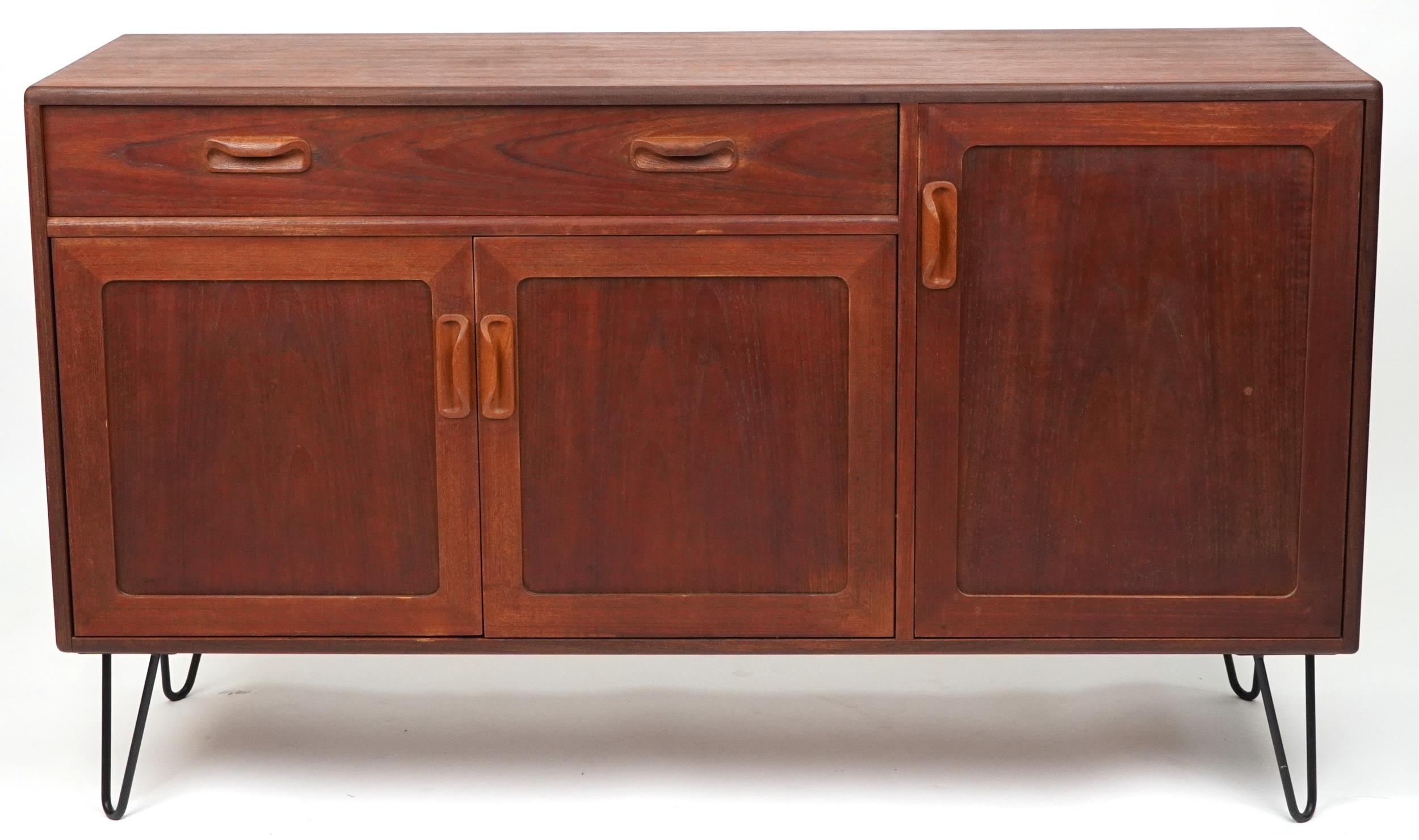 G Plan, Mid century Fresco teak sideboard on hairpin legs fitted with a door and an arrangement of