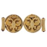 Pair of silver gilt double eagle head design cufflinks set with cabochon rubies, each 2.6cm in
