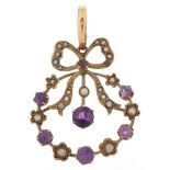 Edwardian unmarked gold amethyst and seed pearl openwork bow design pendant, tests as 9ct gold, with