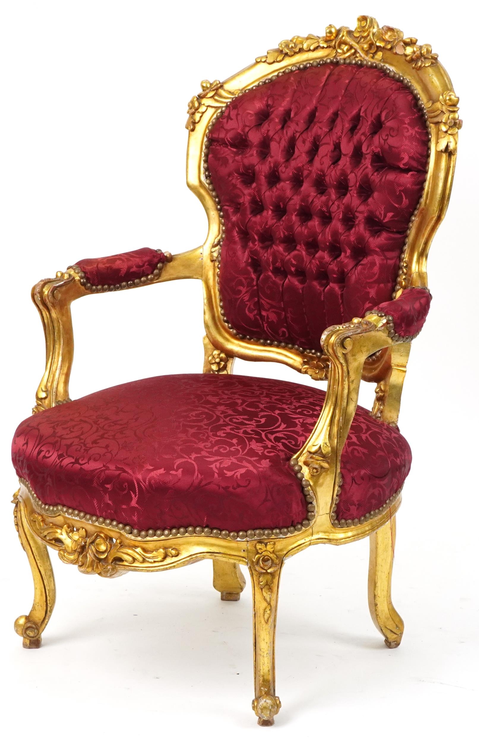 French Louis XV style elbow chair carved with flowers having red part silk floral button back