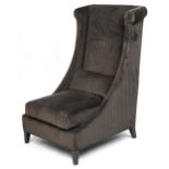 Contemporary dark olive green upholstered throne lounge chair with ebonised legs and cushion,