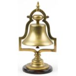 19th/20th century railwayana interest brass railroad bell raised on a circular mahogany base, 34cm