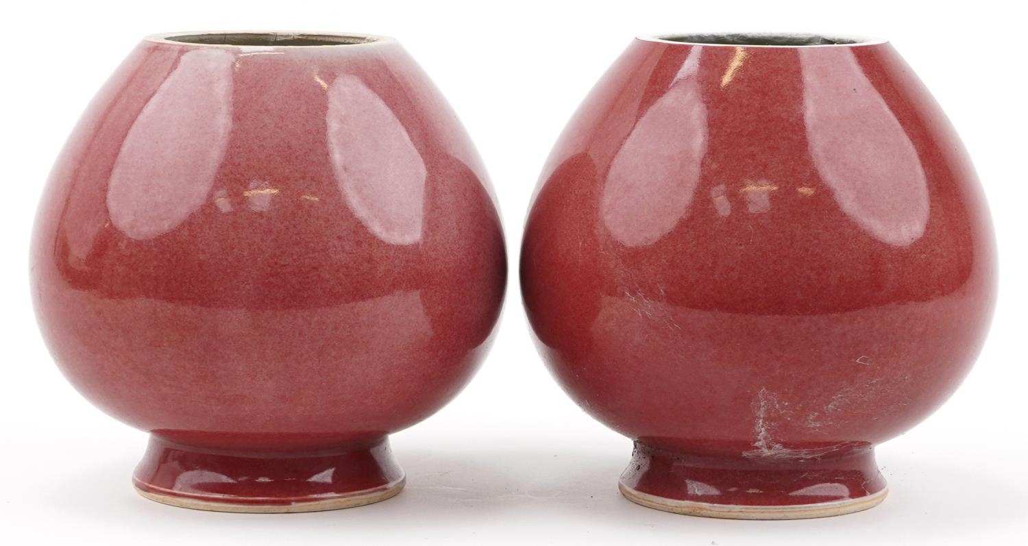 Pair of Chinese porcelain vases having sang de boeuf glazes, six figure character marks to the - Image 3 of 7