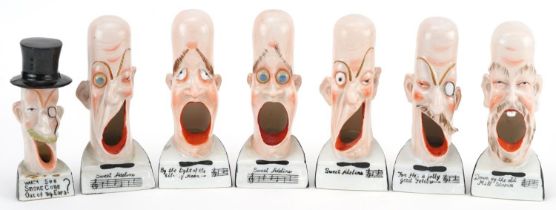 Manner of Schafer & Vater, eight smoking interest early 20th century German porcelain smoking head