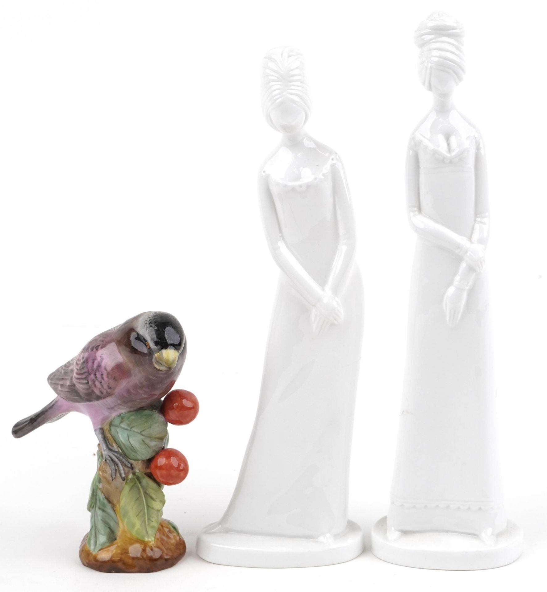 Two Spode figurines and a Spode hand painted porcelain finch, the largest 27.5cm high