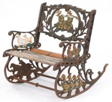 Child's painted cast iron rocking chair with wooden slats, cast with teddy bears and animals, 50cm