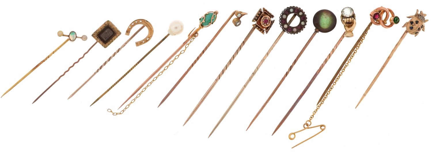 Twelve antique and later gold and yellow metal stickpins including ruby and diamond, opal and - Image 2 of 5