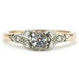 18ct gold diamond solitaire ring with diamond set shoulders, the central diamond approximately 0.
