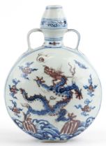 Chinese blue and white with iron red porcelain moon flask with twin handles, hand painted with two