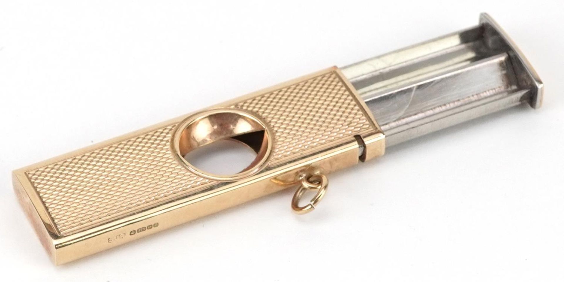 S J Rose & Son, engine turned 9ct gold cased cigar cutter, Birmingham 1985, 5.5cm in length, total - Image 2 of 4