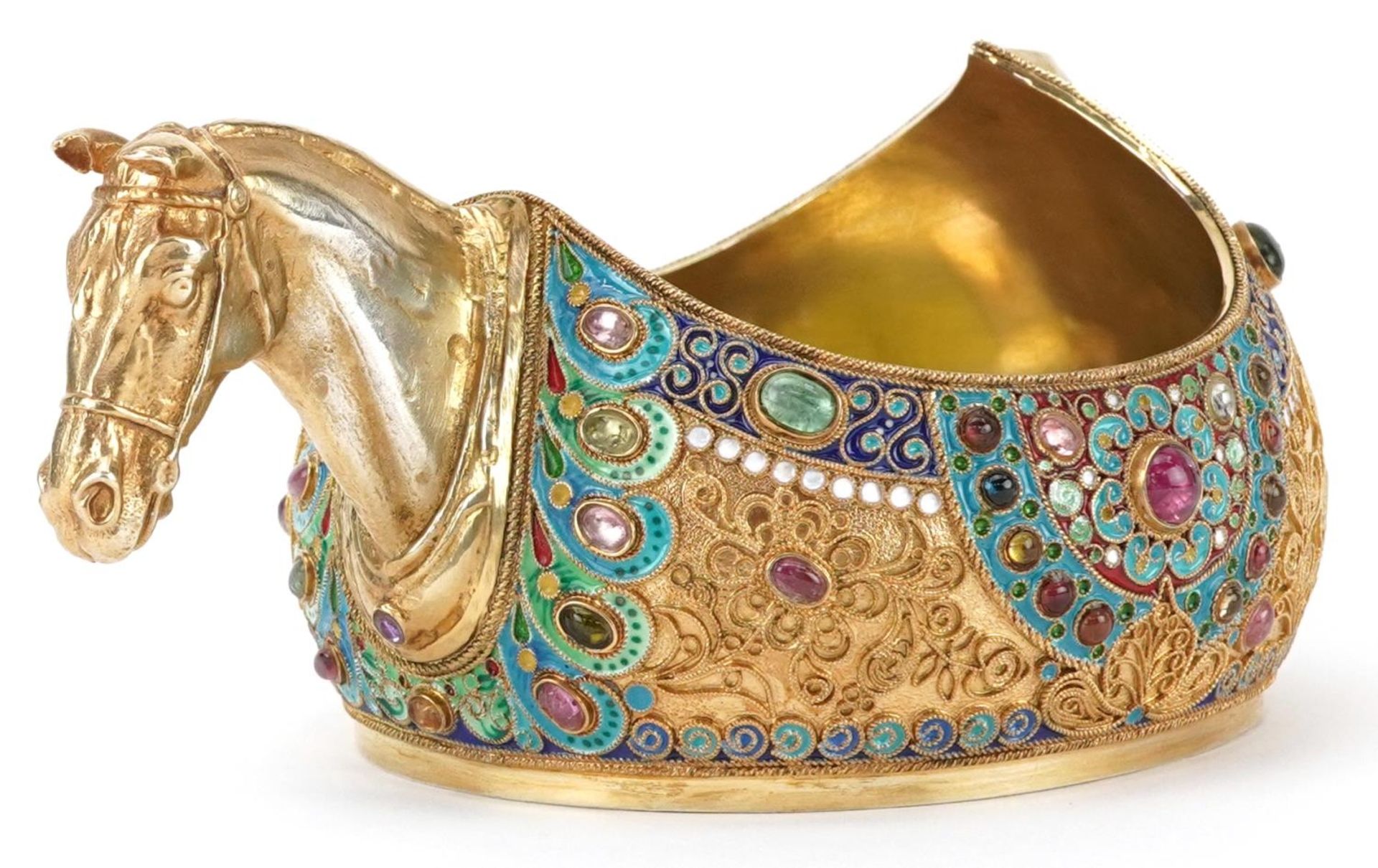 Silver gilt champleve enamel kovsh having a horsehead design handle and set with colourful