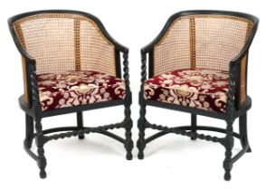 Pair of Victorian ebonised barley twist bergère tub chairs with floral upholstered cushioned