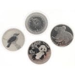 Four continental one ounce fine silver coins comprising three Australian Kookaburras and a 2020