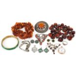 Antique and later jewellery, some silver including amber necklaces, antique style green and clear