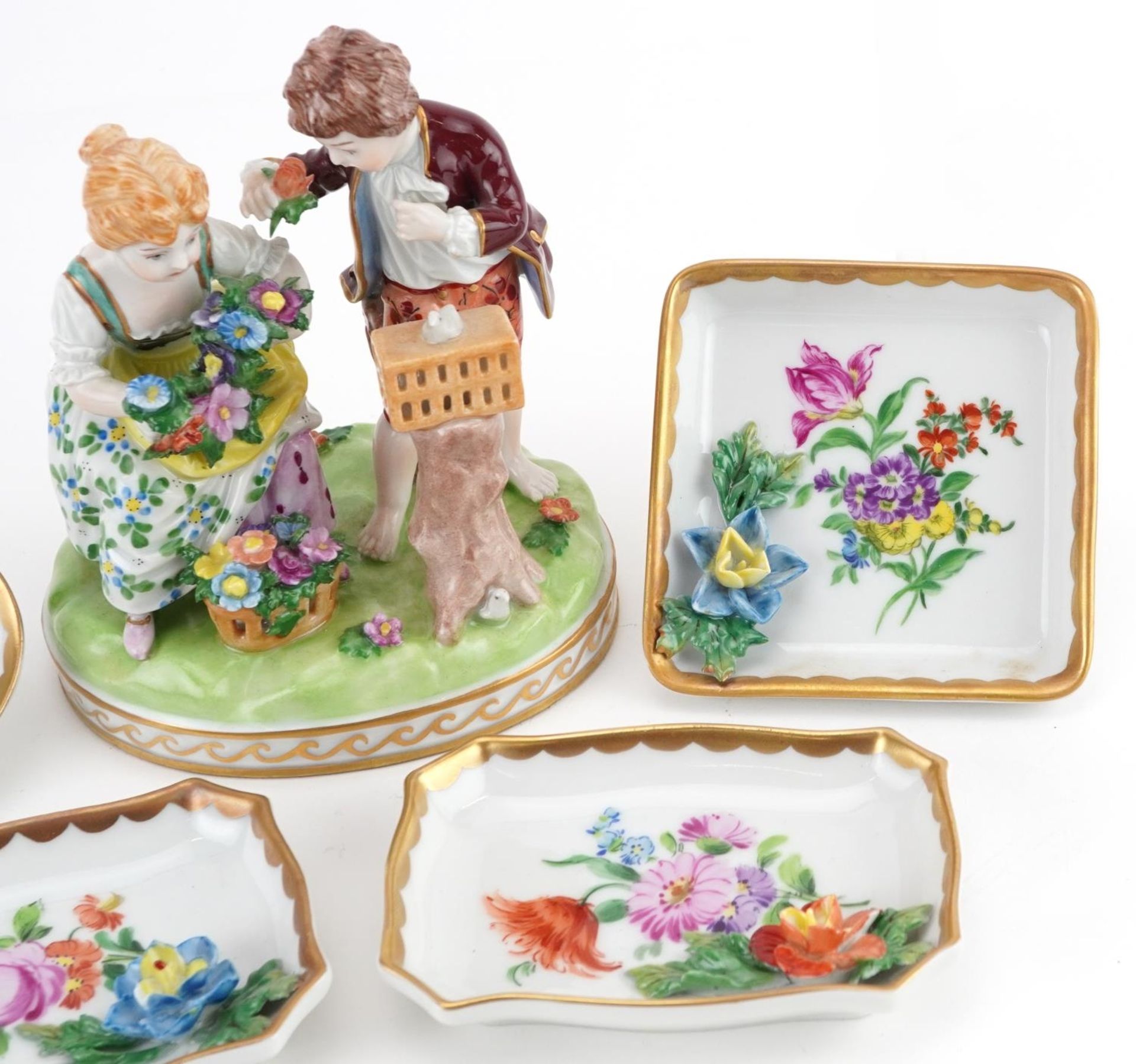 Dresden, German porcelain comprising a summer figure group of a young boy and girl holding flowers - Image 3 of 6