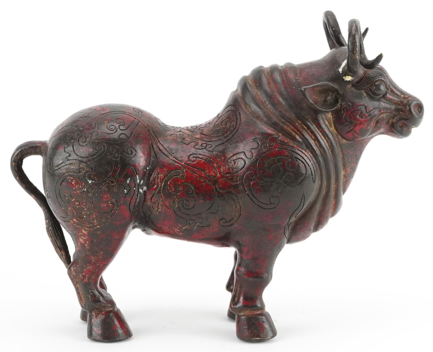 Chinese partially gilt and red lacquered bronze mythical animal, 22.5cm in length - Image 4 of 7