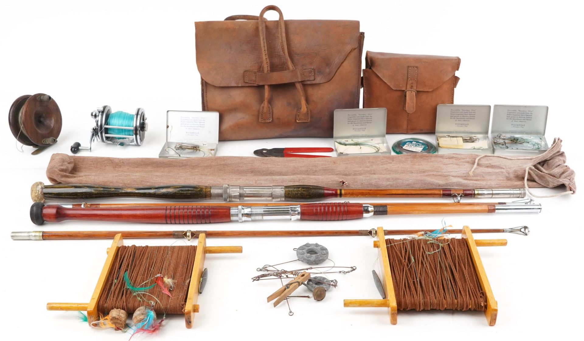 Vintage sporting interest fishing tackle including two reels, two hand lines and flies