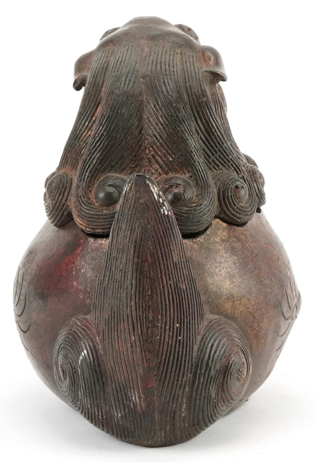 Chino Tibetan partially gilt and red lacquered incense burner in the form of a mythical animal, - Image 3 of 8