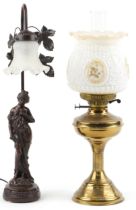 Art Nouveau style bronzed figural table lamp with frilled glass shade and a brass oil lamp with