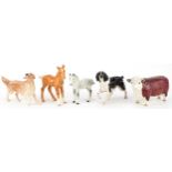 Five Beswick collectable animals including Champion of Champions bull, English Springer Spaniel