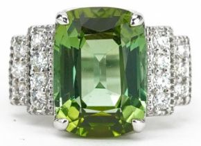 18ct white gold green cushion cut tourmaline ring with diamond set stepped shoulders with