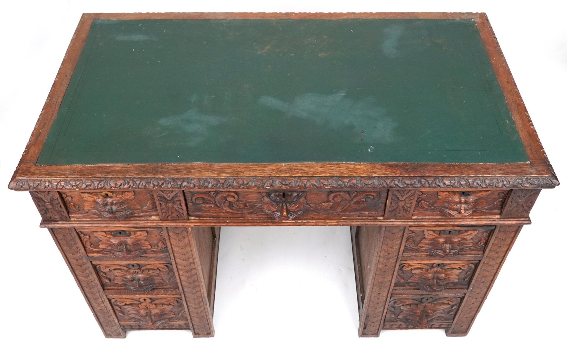 Victorian oak twin pedestal desk carved with a green man masks, fitted with an arrangement of nine - Bild 3 aus 5