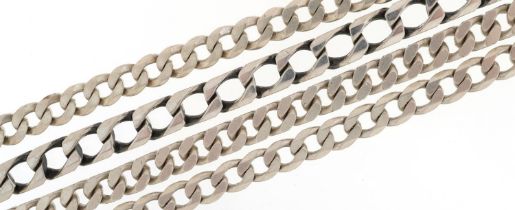 Four silver curb link bracelets, the largest 22cm in length, total 109.2g