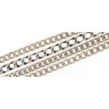 Four silver curb link bracelets, the largest 22cm in length, total 109.2g