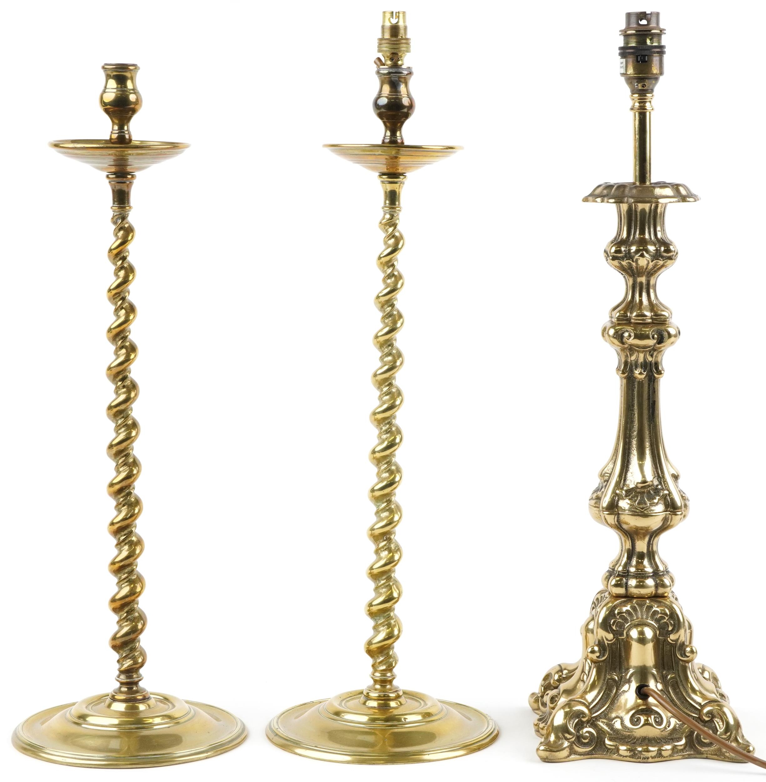 Pair of 19th century turned brass barley twist candlesticks and a classical brass table lamp, 51cm - Image 2 of 3
