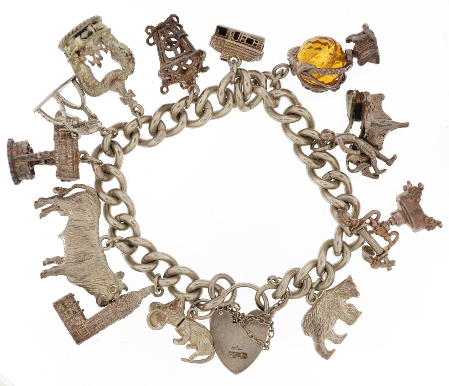 Silver charm bracelet with love heart padlock and a collection of mostly silver charms, including - Image 2 of 3