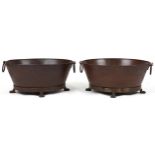Pair of cast metal oval lock buckets with ring turned handles on paw feet, each 32cm H x 72cm W x