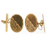 Pair of 9ct gold floral engraved cufflinks, 2.5cm in length, 1.9g