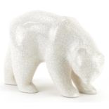 French Art Deco pottery polar bear having a white crackle glaze, 23cm in length