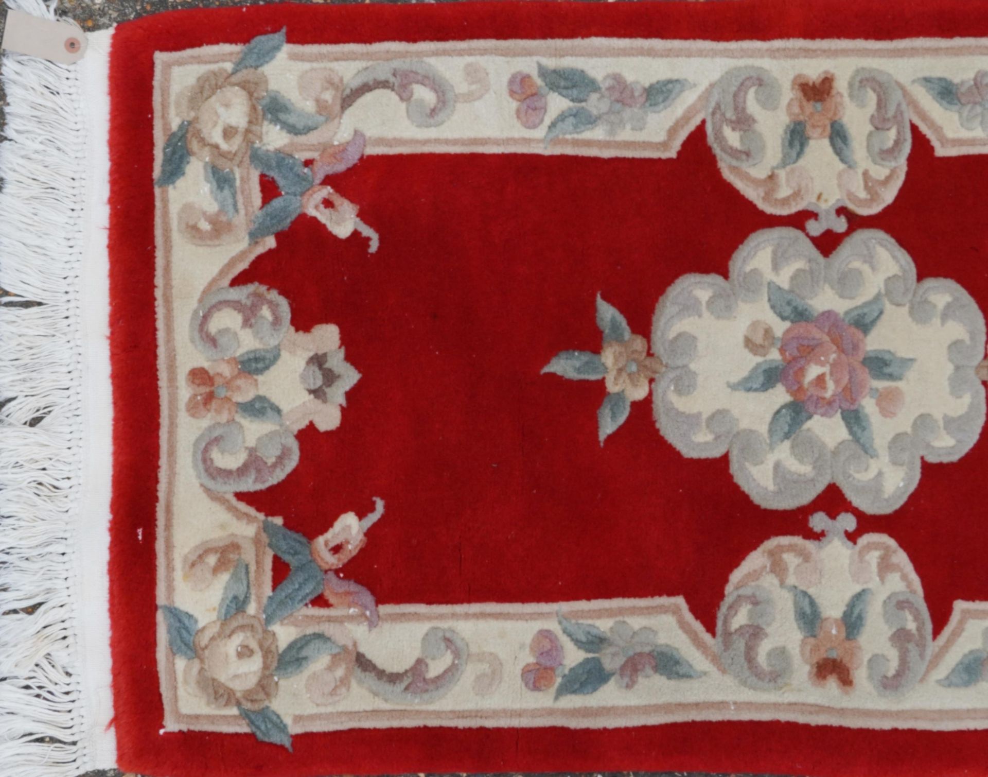 Three Chinese red ground floral rugs including a runner, the largest 255cm x 70cm - Image 7 of 13