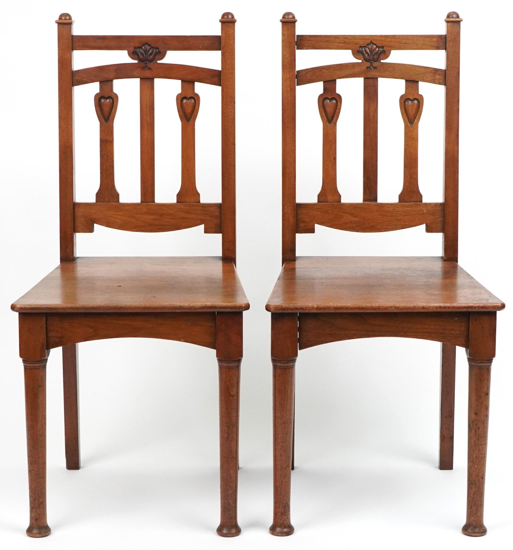 Pair of Arts & Crafts oak side chairs carved with hearts, 96cm high - Image 2 of 4