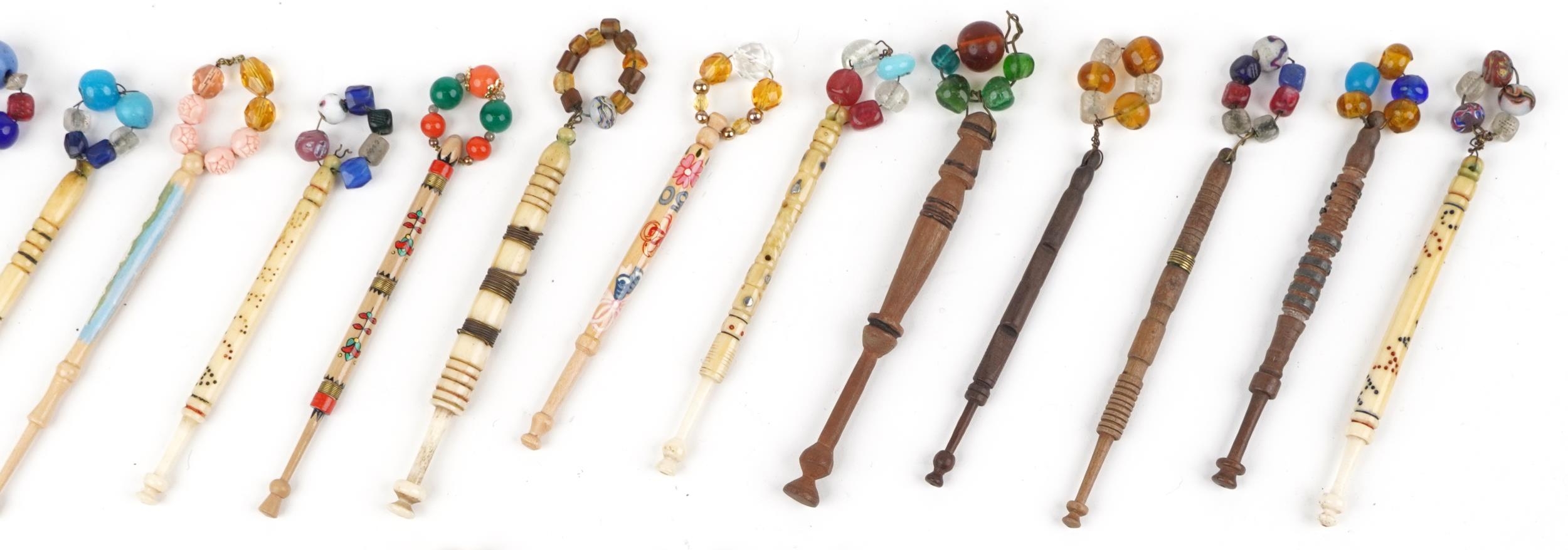 Collection of sewing interest carved bone and hardwood lace making bobbins with beads - Image 3 of 5