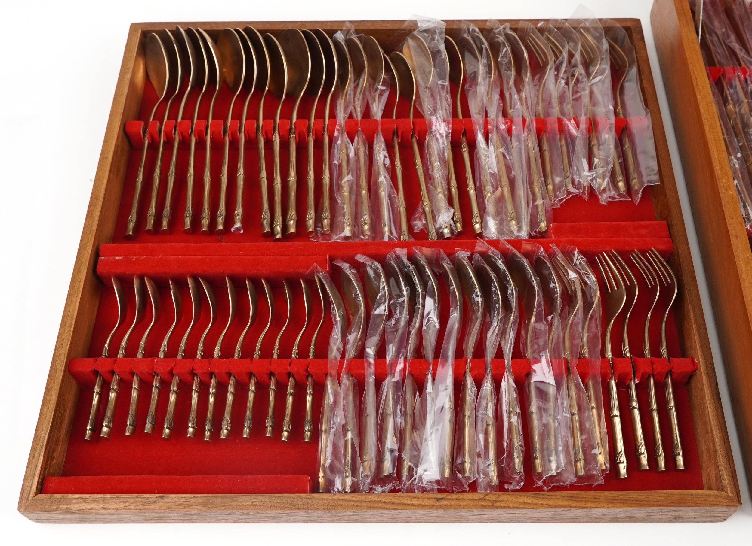Thai twelve place canteen of bronze cutlery with simulated bamboo handles, the canteen 46cm wide - Image 4 of 9