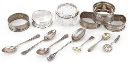 Edwardian and later silver objects including a buttonhole napkin clip, napkin rings, teaspoons and