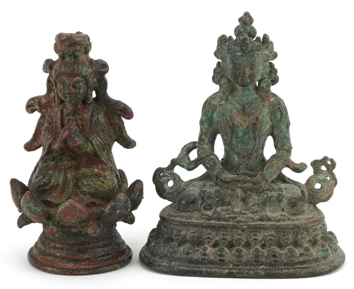 Two Chino Tibetan patinated bronze figures of Buddha, 6cm high
