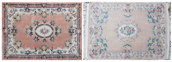 Two rectangular Chinese floral rugs, the largest 195cm x 122cm