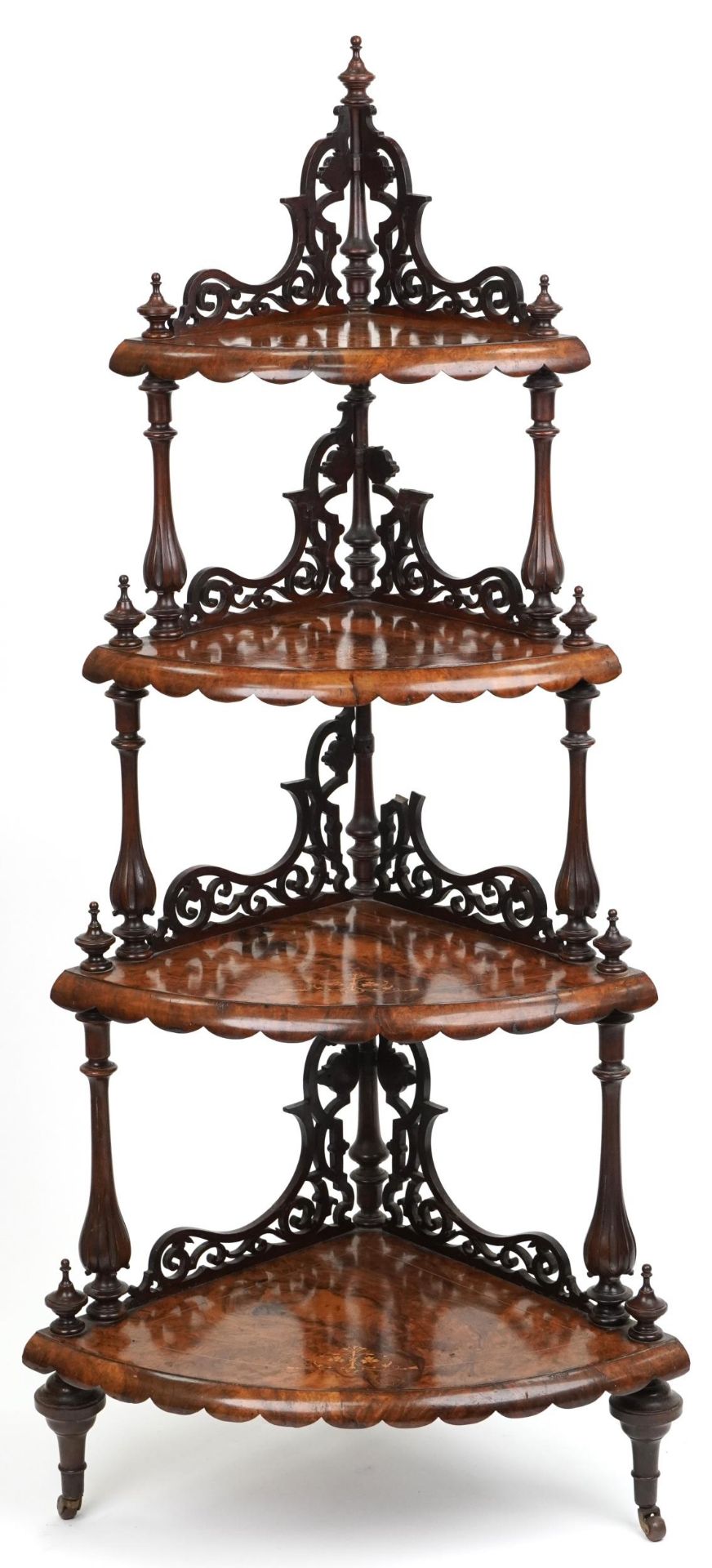 Victorian inlaid burr walnut four tier corner whatnot on casters, 150cm high